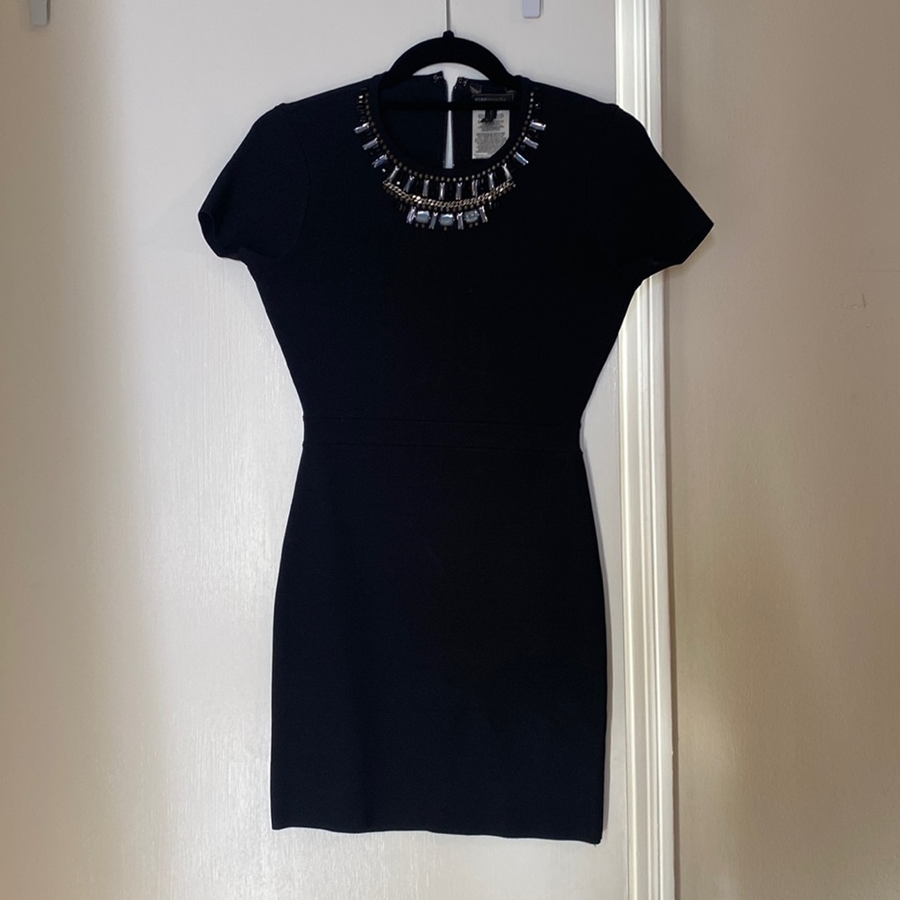 Fitted black mini BCBG dress, size S